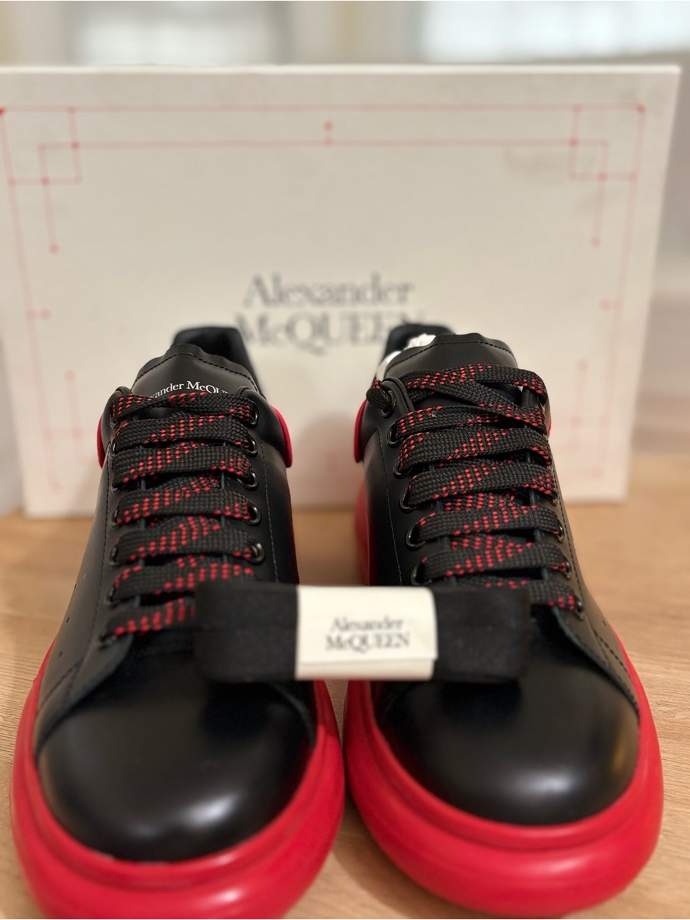 Alexander McQueen Black Leather Sneakers with Red Soles and Accents